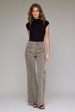 Load image into Gallery viewer, Hidden Cheetah Flare Jeans
